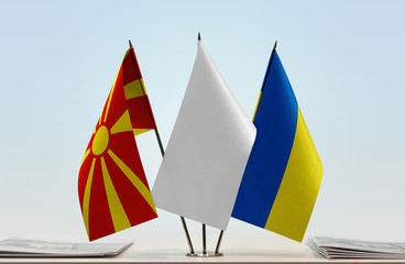 Flags of Macedonia (FYROM) and Ukraine with a white flag in the middle