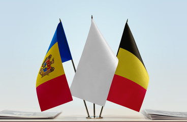 Flags of Moldova and Belgium with a white flag in the middle
