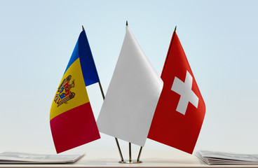 Flags of Moldova and Switzerland with a white flag in the middle