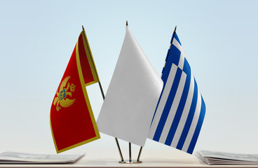 Flags of Montenegro and Greece with a white flag in the middle