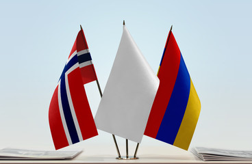 Flags of Norway and Armenia with a white flag in the middle