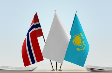 Flags of Norway and Kazakhstan with a white flag in the middle