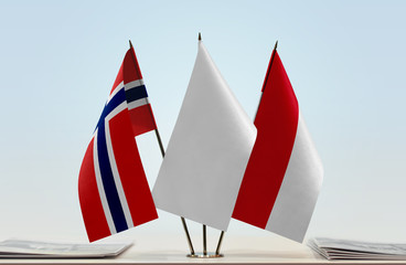 Flags of Norway and Monaco with a white flag in the middle