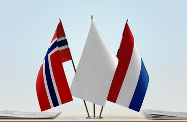 Flags of Norway and Netherlands with a white flag in the middle