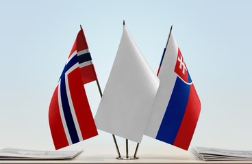 Flags of Norway and Slovakia with a white flag in the middle
