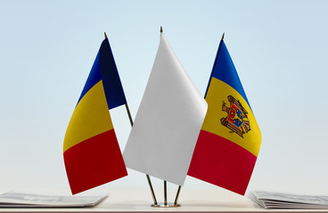 Flags of Romania and Moldova with a white flag in the middle