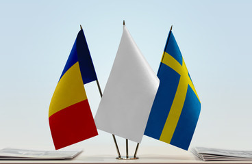 Flags of Romania and Sweden with a white flag in the middle