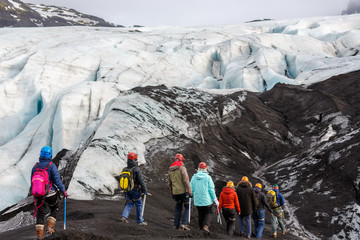 Group of hiker walk on glacier at Solheimajokull - 196430769