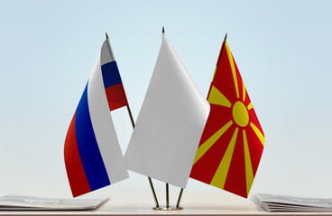 Flags of Russia and Macedonia with a white flag in the middle