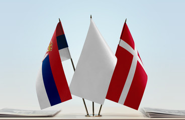 Flags of Serbia and Denmark with a white flag in the middle