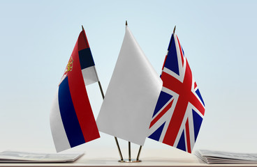 Flags of Serbia and Great Britain with a white flag in the middle