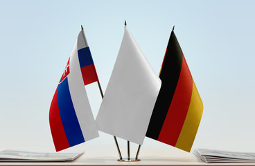 Flags of Slovakia and Germany with a white flag in the middle