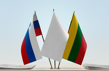 Flags of Slovenia and Lithuania with a white flag in the middle