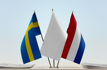 Flags of Sweden and Netherlands with a white flag in the middle