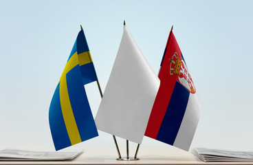 Flags of Sweden and Serbia with a white flag in the middle