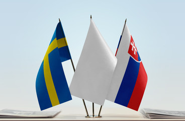 Flags of Sweden and Slovakia with a white flag in the middle