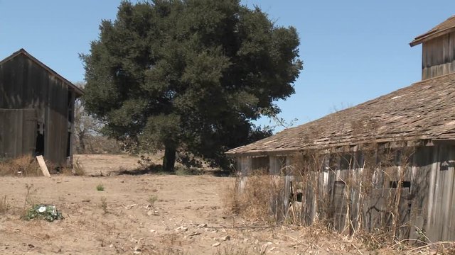 Pan across nn old barn in the Salinas Valley, Monterey County, California.
