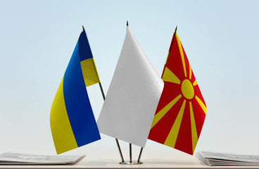 Flags of Ukraine and Macedonia with a white flag in the middle