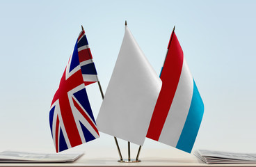 Flags of Great Britain and Luxembourg with a white flag in the middle