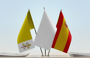 Flags of Vatican City and Spain with a white flag in the middle