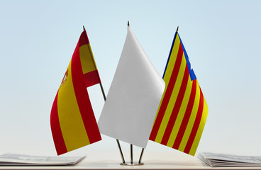 Flags of Spain and Catalan independence movement (Blue Estelada) with a white flag in the middle
