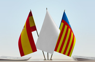 Flags of Spain and Valencia nationalism with a white flag in the middle