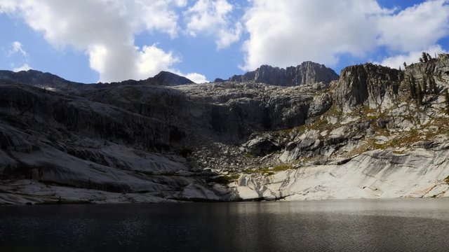 Time-lapse  of clouds over the mountains and Pear Lake in Sequoia National Forest.