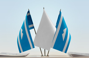 Two flags of Karachay-Balkaria with a white flag in the middle