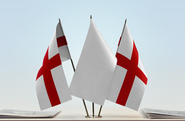 Two flags of Ligurian Republic with a white flag in the middle