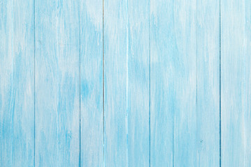 A white blue wooden background.