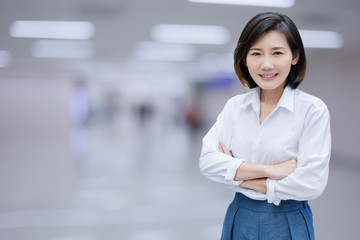 happiness asian woman standing with confident with people meeting background portrait profile photo