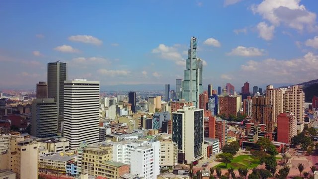 Beautiful aerial establishing shot of old buildings, modern skyscrapers and neighborhoods in downtown Bogata, Colombia.