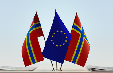 Two flags of Orkney and European Union flag between