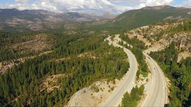 Cars and Trucks Move Along Donner Lake Pass