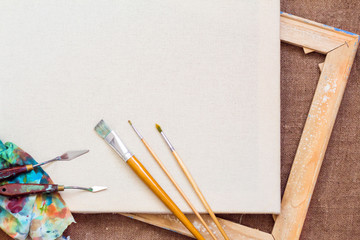 The background for the painting. Canvas Brushes palette knife.