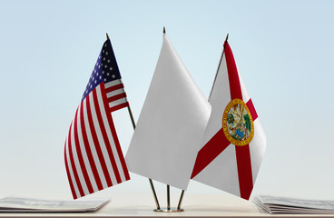 Flags of USA and Florida with a white flag in the middle