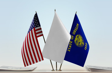 Flags of USA and Oregon with a white flag in the middle