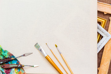 The background for the painting. Canvas Brushes palette knife.