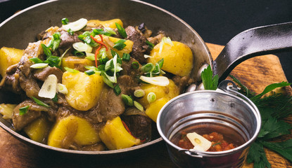 freshly cooked meat and potatoes
