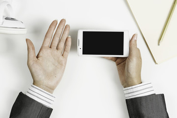 Businesswoman using her smartphone