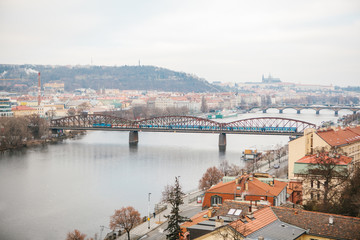 View from a high point. Beautiful views of the Vltava River, the bridge and traditional houses in...