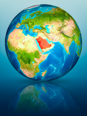 Saudi Arabia on Earth on reflective surface