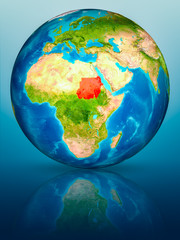 Sudan on Earth on reflective surface