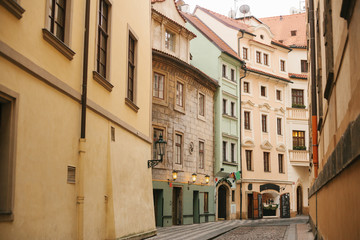 Fototapeta na wymiar A beautiful street with traditional houses in Prague in the Czech Republic.