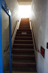 dark stairway leading to bright sun