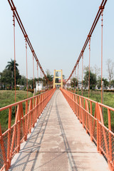 orange color cement suspension bridge