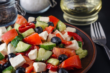 Greek salad on a dark background