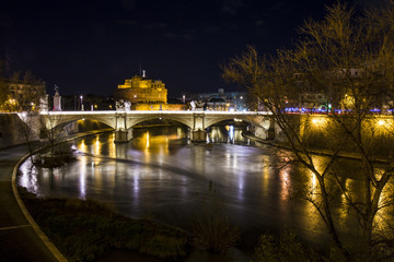 Rome. Landscape of the Castel Sant'Angelo fortress and the Vittorio Emanuele II bridge over the Tiber river.