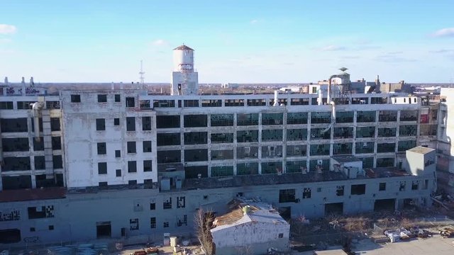 An aerial over the ruined and abandoned Packard automobile factory near Detroit Michigan.