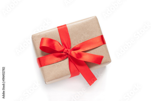 Download "Gift box tied with red ribbon and bow. Festive packaging ...